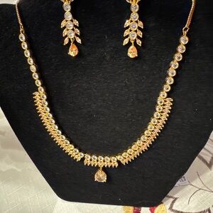 Elegant Gold and Silver Necklace and Earring Set
